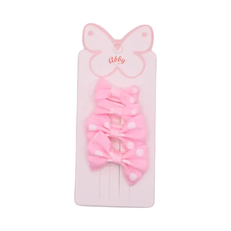 Set de ligas con moños rosas – Paquete de tres